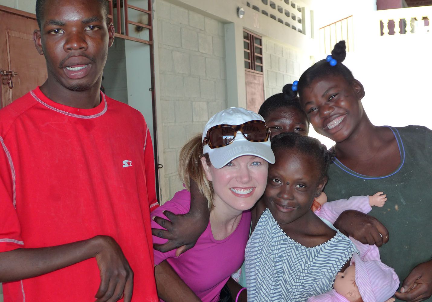 Shannon Skokos Loving on children in Haiti